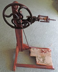 Friction drive spinning wheel made by Gisborne Engineering Company in New Zealand in 1918.