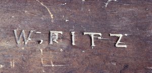 "W. FITZ" mark on top of table.