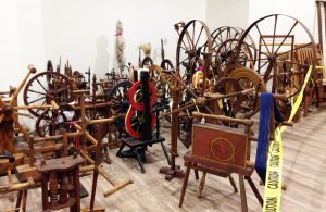Henzie Collection spinning wheels and reels waiting to be arranged.