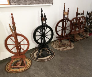Three upright Icelandic spinning wheels