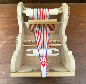 Reproduction of a "cradle loom"