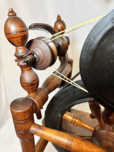 Detail from the rear of spinning wheel marked B. SANFORD